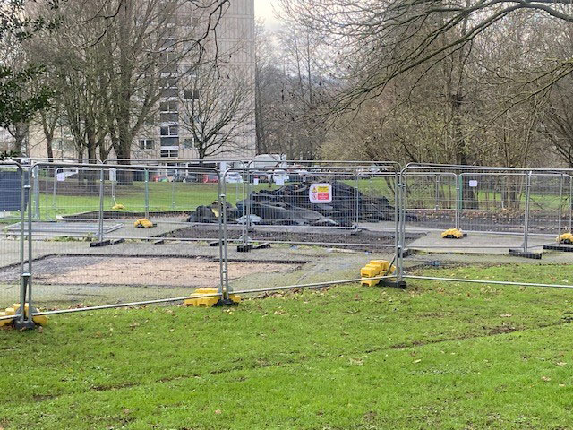 A picture showing that play equipment has been removed from Downshire Field, to prepare the area for infrastructure installation.